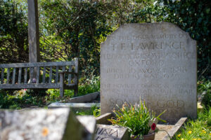 a headstone showing the resting place of t.e. lawrence